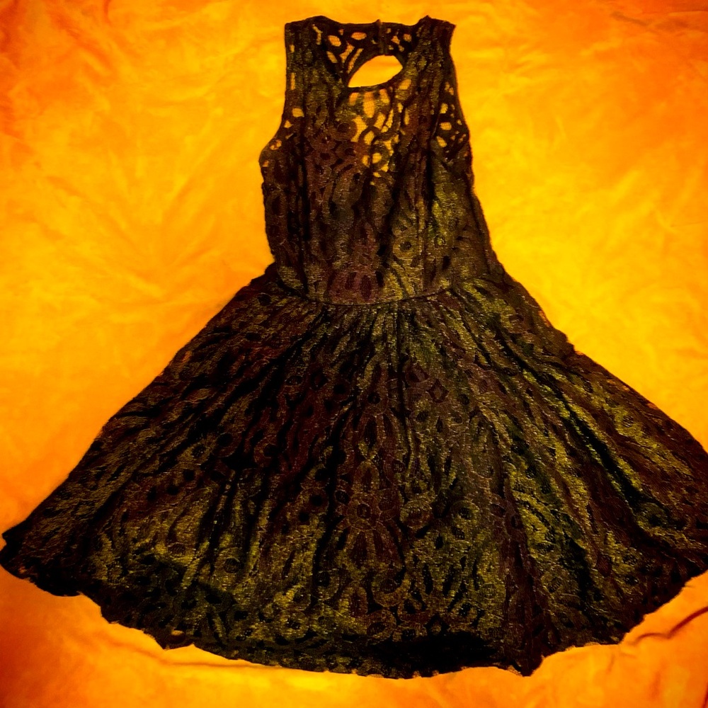 Vintage black and gold shimmer lace cocktail dress.